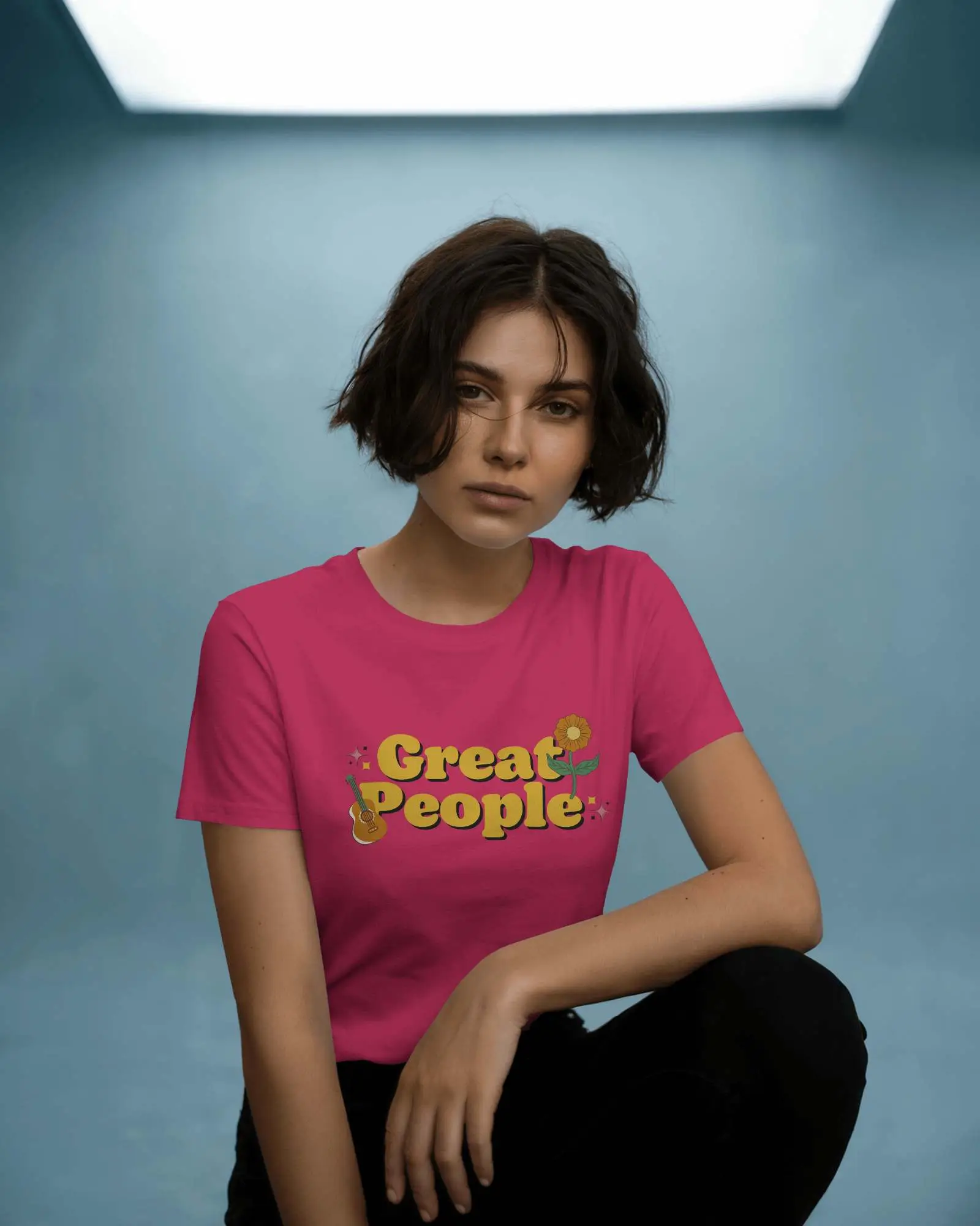 Casual Fashion T Shirt Template Mockup Short Haired Female Model Looking Forward In Moody Lighting