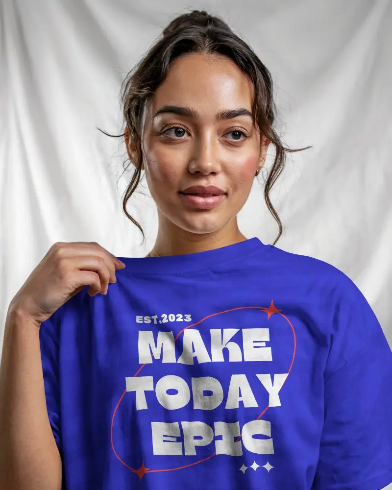 Plain Front Tshirt Design Mockup On Model Holding Fabric To Showcase Logo Placement Area