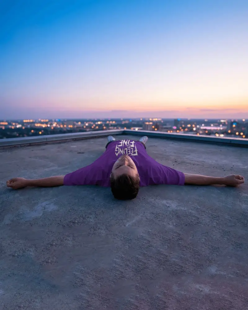 Urban Rooftop Lifestyle Relaxed Tshirt Mockup For Modern Casual Fashion Brand Marketing