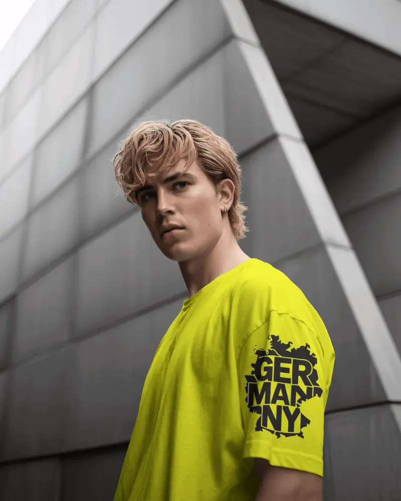 Modern Streetwear T Shirt Mockup Young Male Model Against Geometric Architectural Background