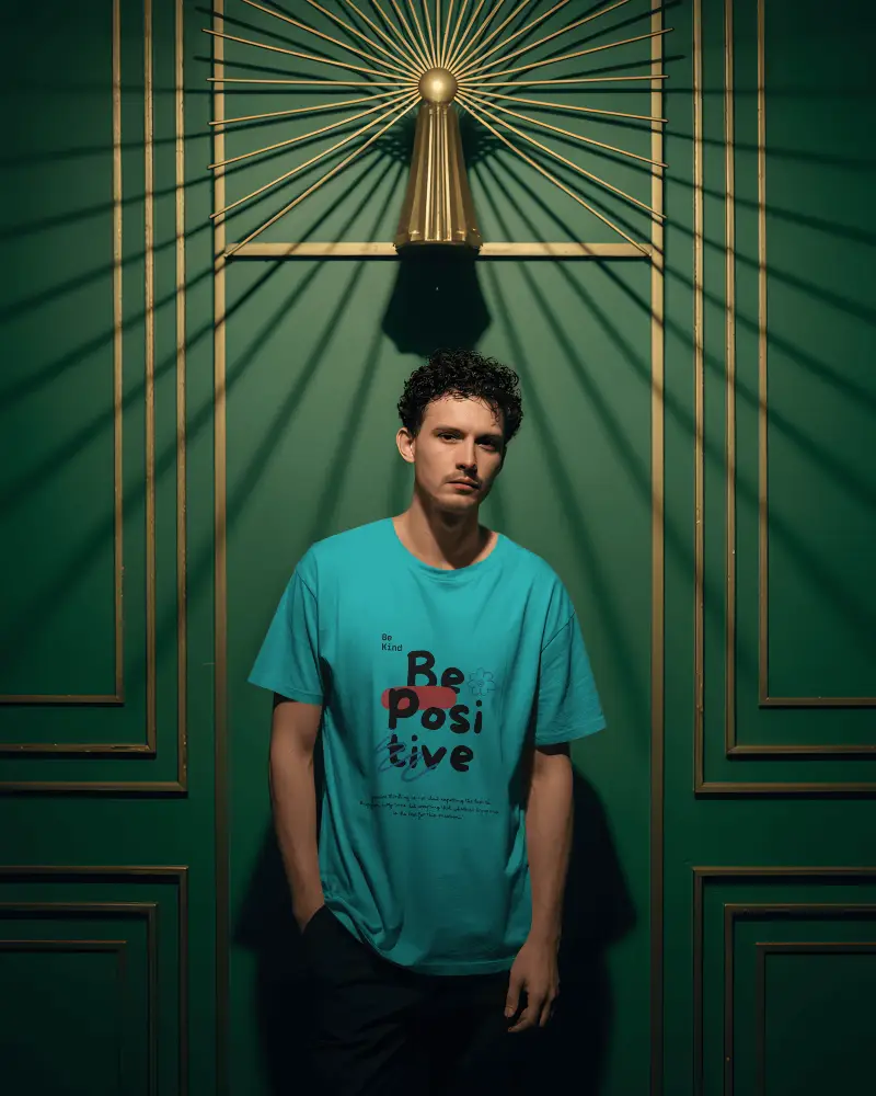 Vintage Styled Tshirt Mockup Model Under Sunburst Golden Deco On Rich Green Wall Paneling 02028