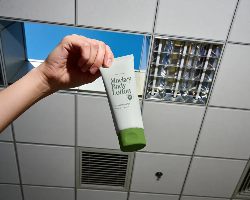 Disposable Blank Tube Mockup Held In Hand For Branding And Design Presentations