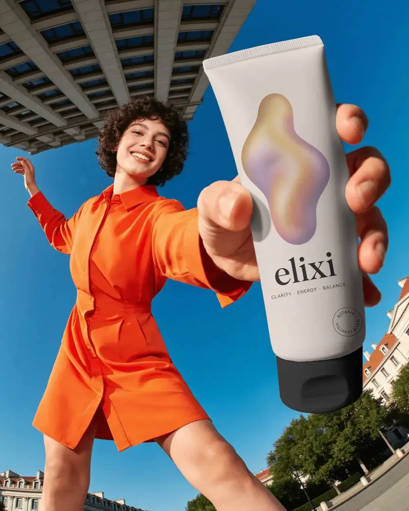 Person Holding Large Cosmetic Tube Mockup Outdoor Clear Sky Background