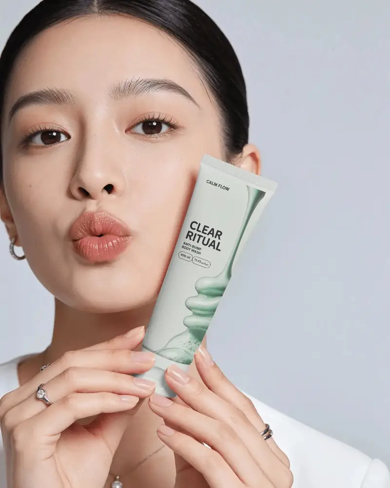 Natural Skin Care Tube Mockup Held By Person For Beauty Product Presentation Display