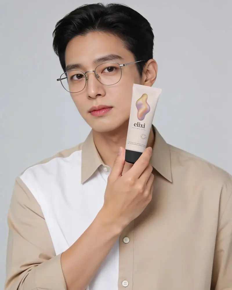 Man Holding Skincare Tube Mockup For Beauty Product Presentation And Advertising