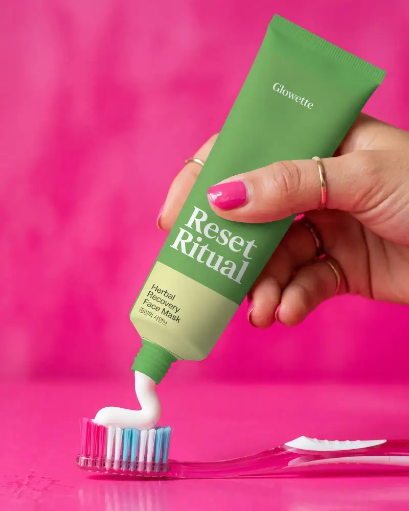 Realistic Toothpaste Tube Mockup With Squeezing Action Over Toothbrush Bristles