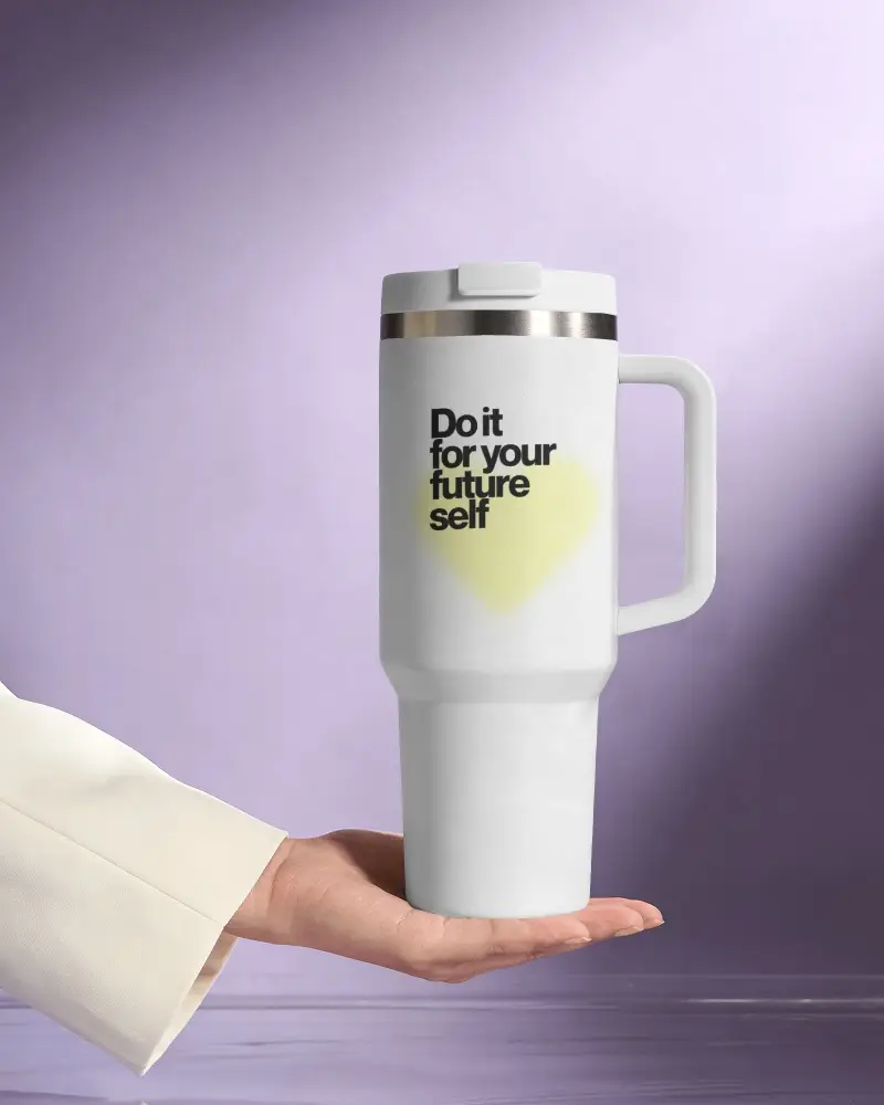 Premium Travel Tumbler Mockup Balanced On Hand With Clean Gradient Lighting Lavender Backdrop