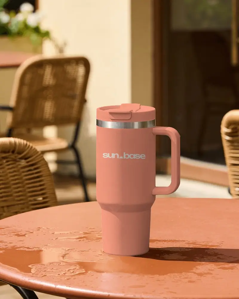 Outdoor Cafe Tumbler Mockup On Wet Table With Wicker Chair Background Cozy Patio Setting