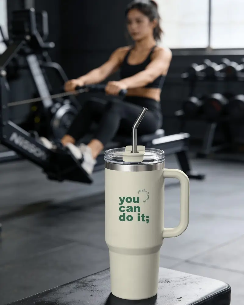 Gym Tumbler Mockup With Straw On Workout Bench And Rowing Machine Background