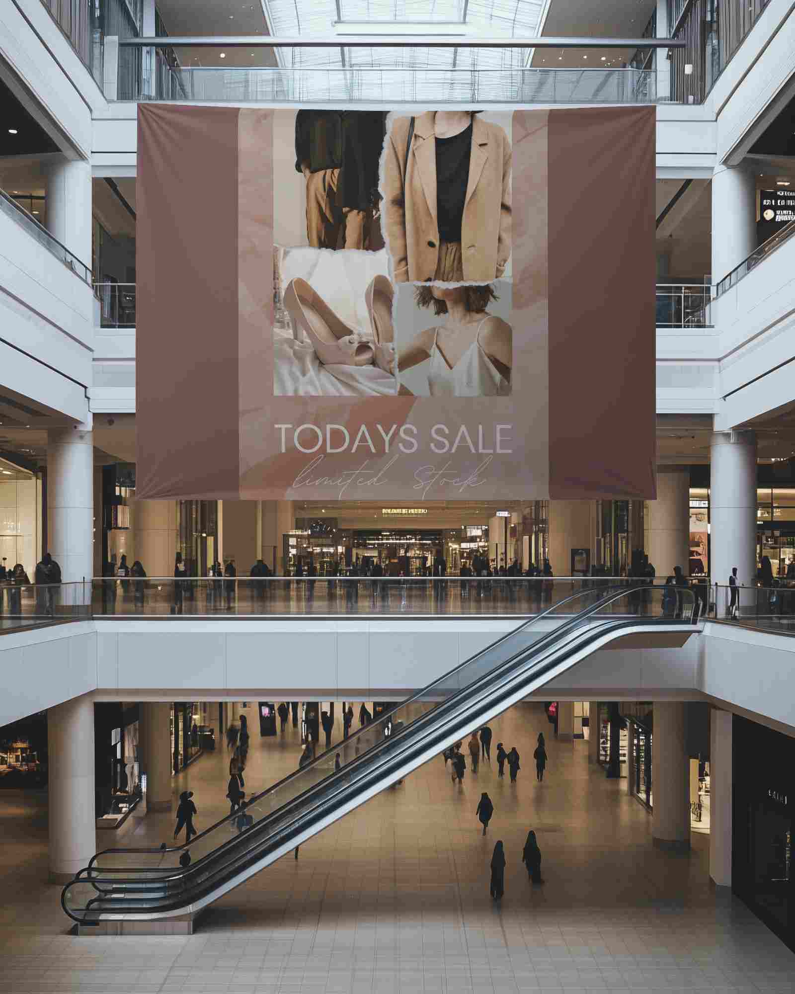 Large Shopping Mall Banner Mockup Hanging Above Escalator In Modern Retail Center With Shoppers And Natural Light