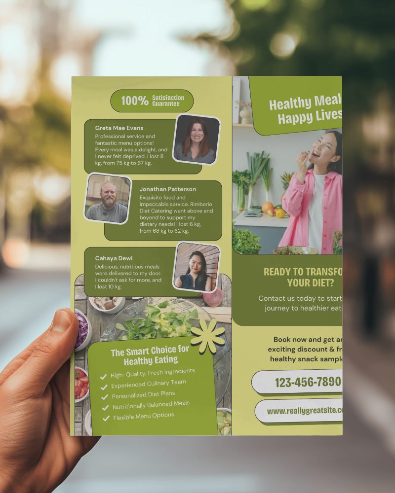 Hand Presenting Brochure Mockup With Blurry Street Scenery