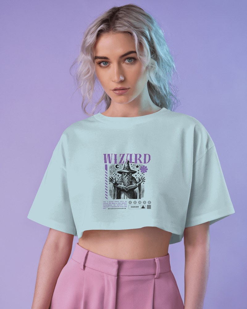 Fantasy Inspired Wizard Graphic Crop Top Mockup Loose Fit Light Blue Short Sleeve Design Purple Tones