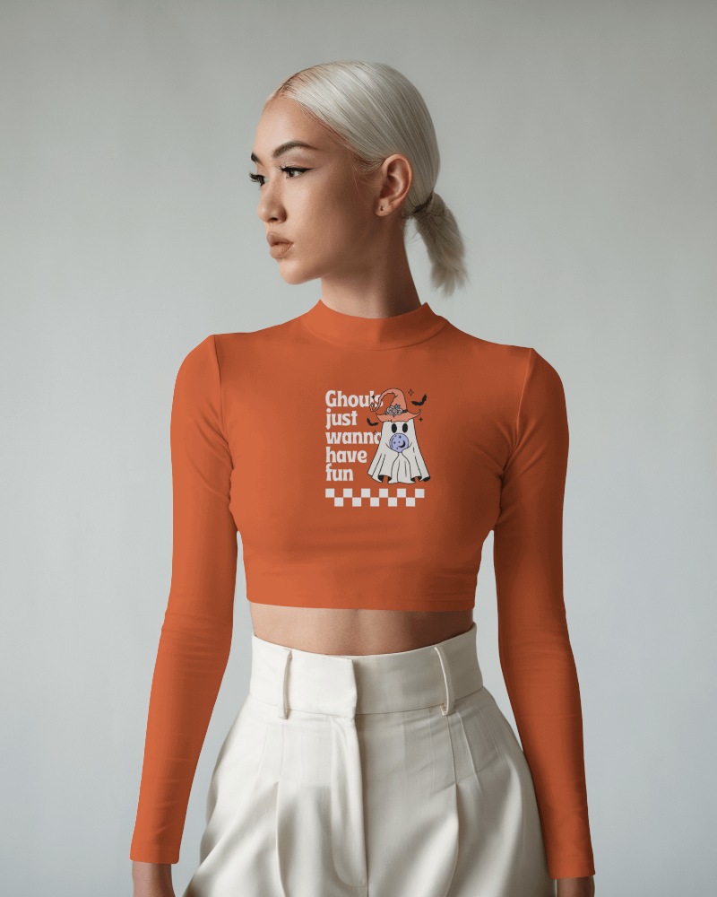 Fashion Forward Orange Crop Top Mockup Stylish Halloween Design Printed On Long Sleeve Tight Fit Shirt In Neutral Setting