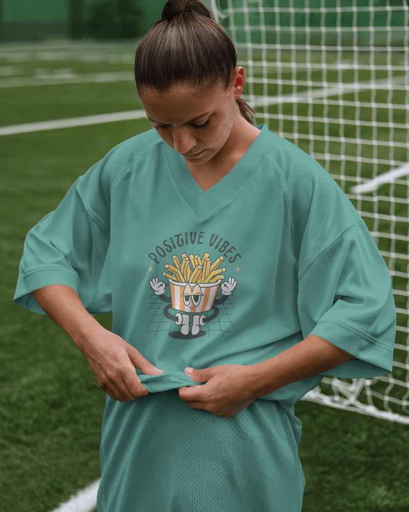 Dynamic Sports Jersey Mockup Female Soccer Player On Green Field With Vibe Graphic