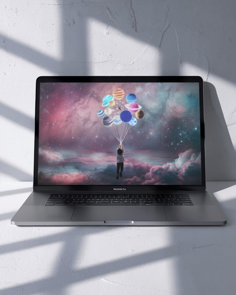 Macbook Air M2 Placed On White Surface With Sunlit Shadows Casting Geometric Patterns For A Stylish Minimalist Look