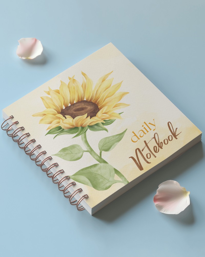 Delicate Floral Notebook Mockup On Soft Blue Surface With Petal Decorations Fresh And Elegant