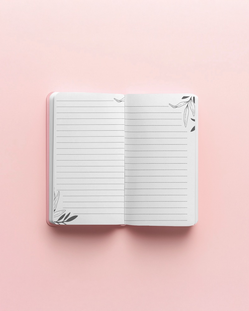 open-notebook-mockup-top-view-double-page-layout-on-soft-pink-background-minimal-and-feminine-aesthetic-with-clean-white-pages-034