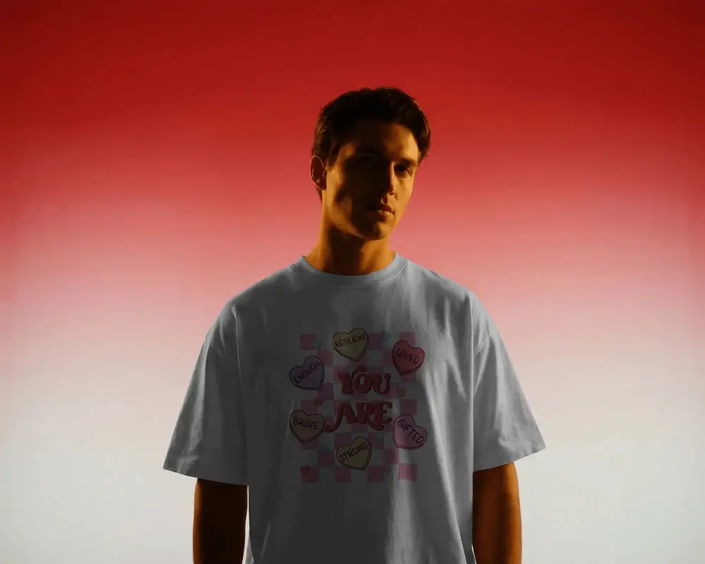 Minimal Man Wearing Plain Tshirt Mockup Against Gradient Valentine Themed Background Perfect