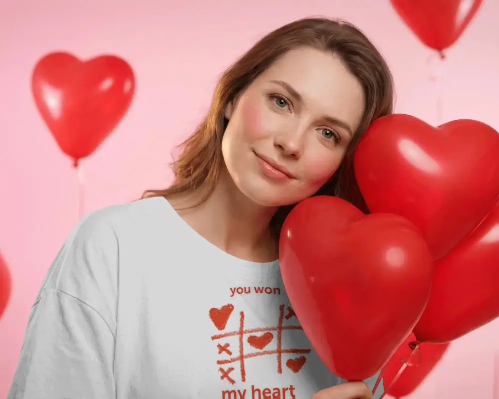 Romantic Valentine Tshirt Mockup With Woman Holding Heart Shaped Balloons For Love Theme