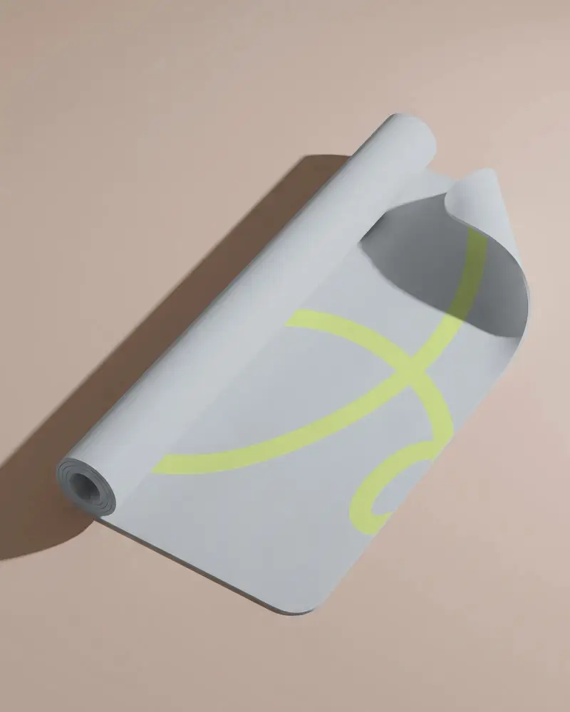 Minimal Yoga Mat Mockup On Neutral Surface With Rolled Corner Detail And Modern Wellness Style