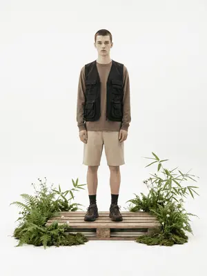 Replace the sweatshirt and half jacket while maintaining the consistency and the structure