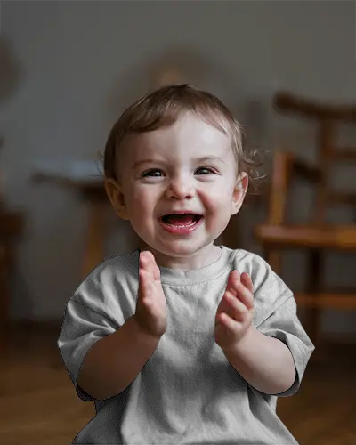 Baby Tee Mockup Happy Cute Infant Wearing Tshirt Smiling And Clapping In Warm Indoor Light