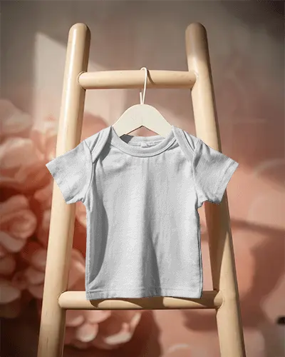 Baby Tee Mockup Gray Infant Tshirt On Wooden Ladder With Soft Floral Backdrop And Warm Studio Light