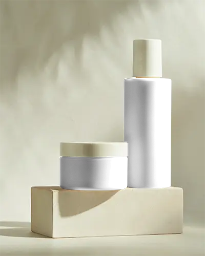 minimalist-cosmetic-jar-and-serum-mockup-styled-on-neutral-stone-block-soft-natural-lighting