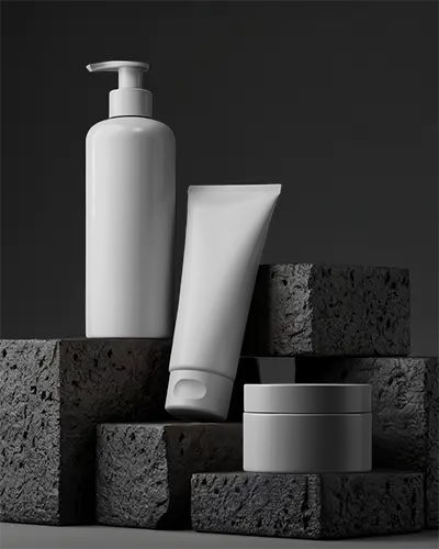 Luxury Skincare Packaging Set Mockup With Pump Bottle Tube And Jar On Textured Block Platform