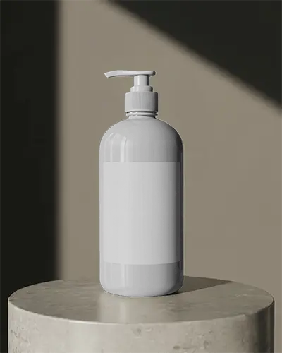 cosmetic-pump-bottle-mockup-standing-upright-on-round-marble-slab-with-dramatic-light-and-bold-shadow