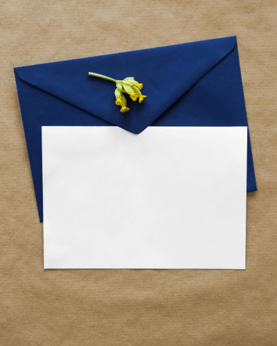greeting-card-enclosed-in-an-envelope-with-flower-lying-on-it-13