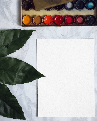 flatlay-greeting-card-with-leaf-and-colors-on-table-18