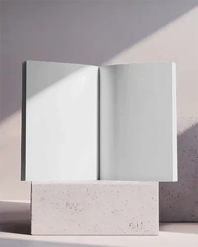blank-magazine-mockup-open-pages-on-minimalist-stone-pedestal-for-design-display