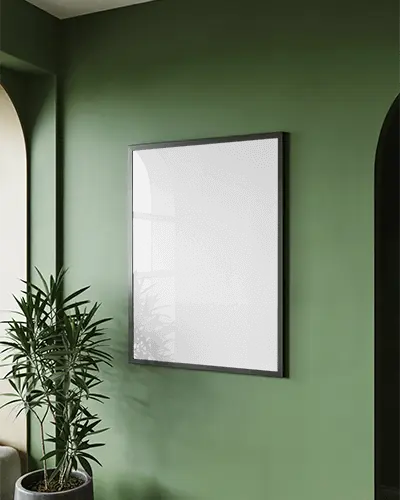 Minimalist Wall Poster Mockup On Textured Green Wall With Lush Potted Plant For Design Showcase