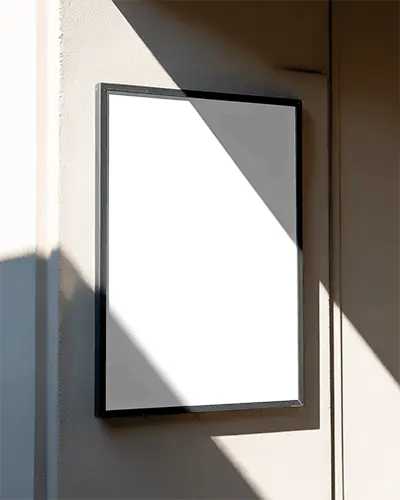 Sleek Vertical Poster Mockup With Sharp Shadow Contrast On Rough Textured Wall