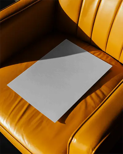 Modern Poster Mockup On Luxury Leather Sofa With Natural Light Shadow Effect