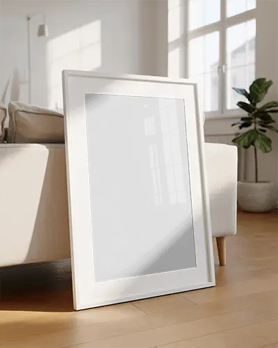 high-quality-poster-mockup-on-wooden-floor-next-to-luxury-couch-and-plant