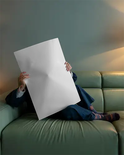 Cozy Interior Poster Mockup Person Holding On Sofa Relaxed Home Atmosphere Creative Display