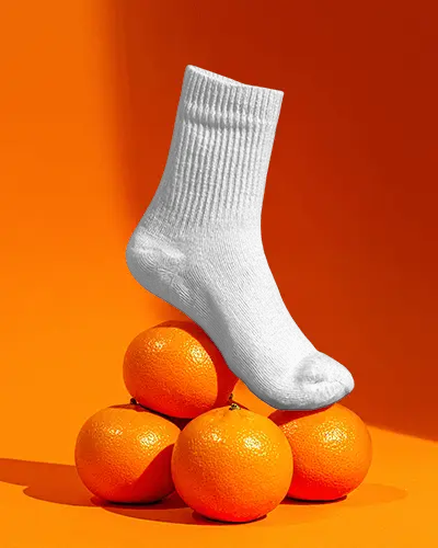 Crew Socks Mockup Balanced On Fruit Creative Studio Product Photography