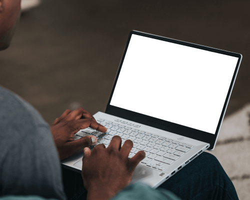 Compact Laptop Mockup On Lap In Relaxed Setup With Ambient Light