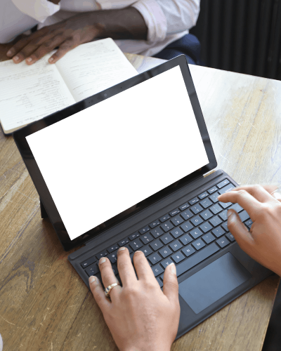 Tablet Laptop Mockup With Keyboard In Collaborative Office Setting