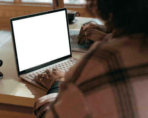 Laptop Mockup In Collaborative Work Environment With Multiple Users