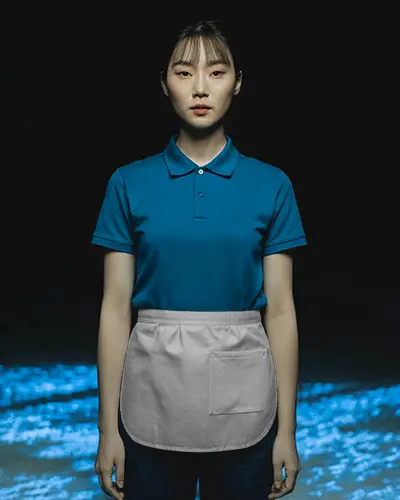 Dramatic Portrait Apron Mockup On Standing Model With Focused Expression Cinematic Lighting Depth