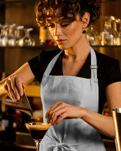 elegant-bar-apron-mockup-female-bartender-pouring-drink-in-moody-lighting