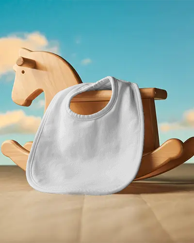 Baby Bib Mockup On Wooden Rocking Horse With Cotton Absorbent Fabric For Baby Care