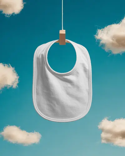 Soft Baby Bib Mockup Hanging On Wooden Clip With Cloud Background For Children