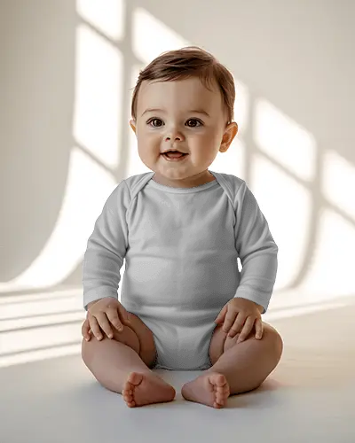Baby Onesie Mockup Smiling Baby Sitting Front View Sunlit Interior Soft Natural Light
