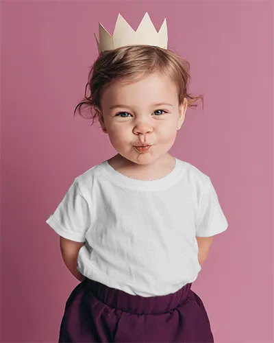 Cute Baby Tee Mockup With Kid Smiling Standing In Studio Background For Design Showcase