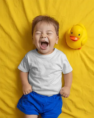 Adorable Baby Tee Mockup Laughing Toddler Lying On Soft Fabric Background