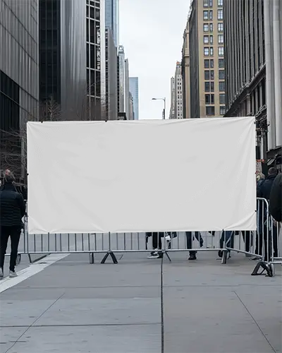 Large Outdoor White Banner Mockup Attached To Metal Fence In Metropolitan Street Scene With Walking Crowds